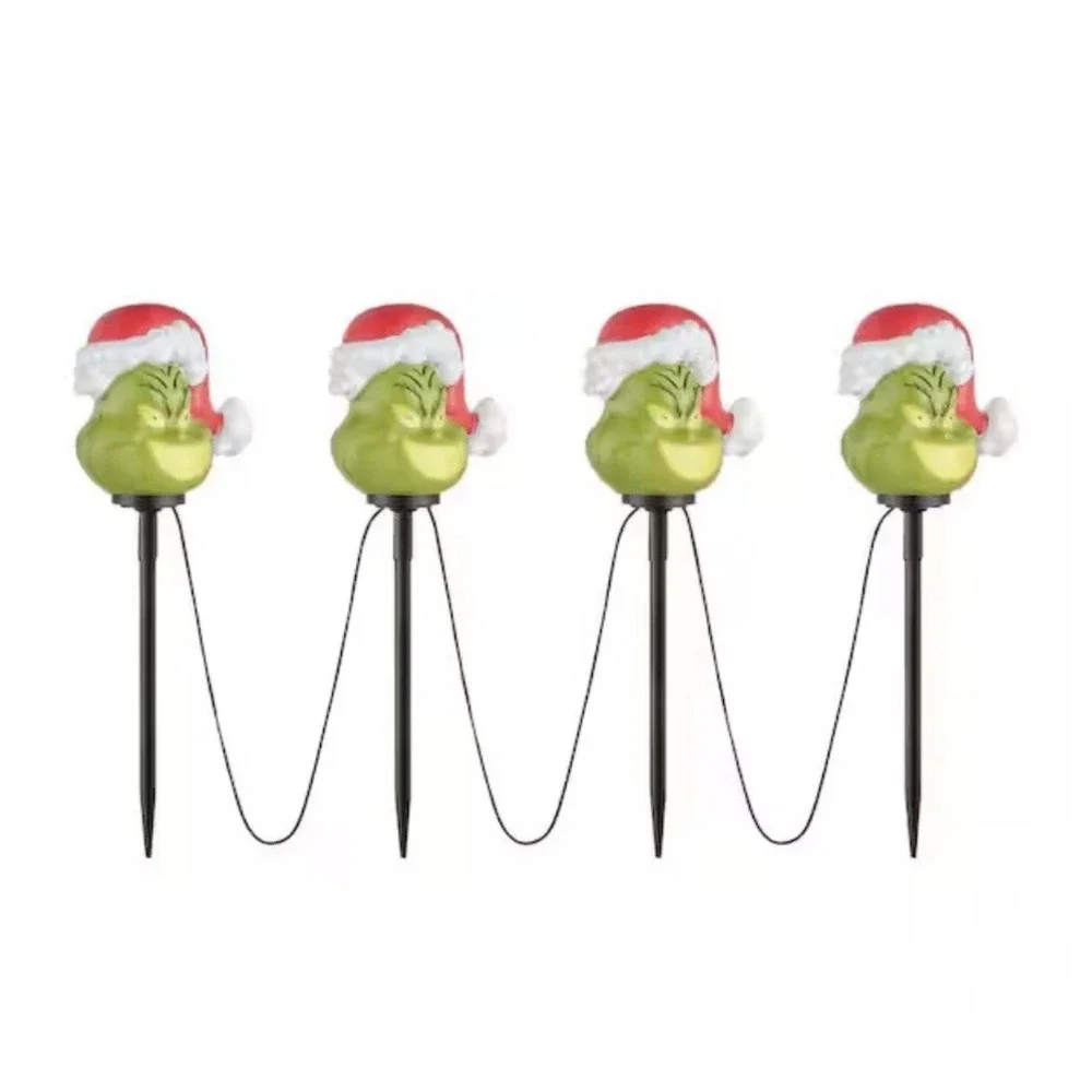 Gemmy Christmas Grinch Battery-Operated Pathway Stakes (4 Count) With Santa Hat‎